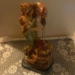 Lady at the water well